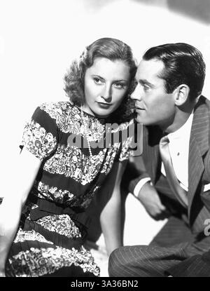 Februar 2005: Barbara Stanwyck, Henry Fonda, am Set des Films „The Mad Miss Manton“, 1938 (Bild: © Glasshouse/ZUMA Wire) Stockfoto