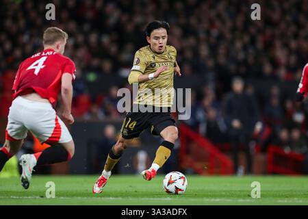 Manchester, Großbritannien. März 2025. Real Sociedad Mittelfeldspieler Takefusa Kubo (14) während der Achtelrunde der UEFA Europa League Manchester United FC gegen Real Sociedad, 2nd Leg Match in Old Trafford, Manchester, England, Vereinigtes Königreich am 13. März 2025 Credit: Phil Duncan/Every Second Media Credit: Every Second Media/Alamy Live News Stockfoto