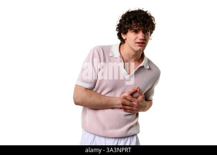 Herzschmerz durch plötzlichen schmerzhaften Myokardinfarkt. Lebensbedrohliche Entzündungsendokarditis. Der Mann hat mit Herzmuskel i zu kämpfen Stockfoto