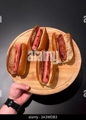 Traditional hot dog with sausage grilled on the barbecue Stockfoto