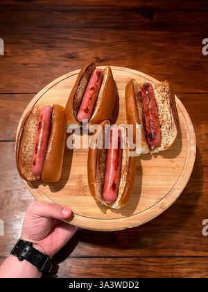 Traditional hot dog with sausage grilled on the barbecue Stockfoto