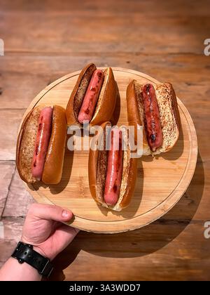 Traditional hot dog with sausage grilled on the barbecue Stockfoto