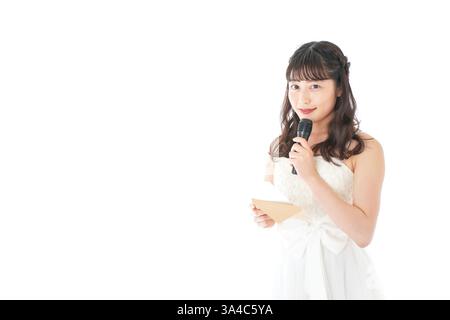 Braut spricht am Mikrofon Stockfoto