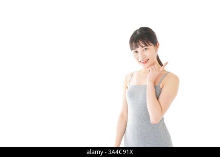 Junge Frau, die Schönheitstipps gibt Stockfoto