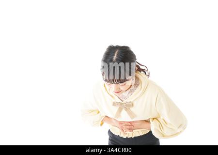 Junge Frau leidet Schmerzen im Unterleib Stockfoto