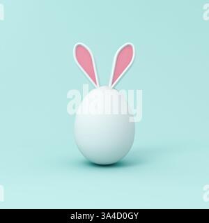 Minimales weißes Osterhasen-Ei isoliert auf hellblauem, grünem Cyan-Hintergrund mit Schatten minimaler kreativer Idee konzeptionelles 3D-Rendering Stockfoto