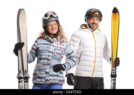 Junger Mann und Frau mit Skiausrüstung, Wintersportkonzept isoliert auf weißem Hintergrund Stockfoto