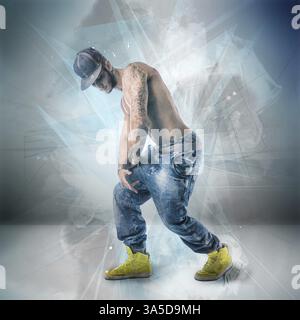Hip Hop Tänzer zeigen einige Bewegungen in weißem Hintergrund Stockfoto