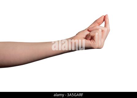 Die weibliche Hand drückt ein winziges unsichtbares Objekt zwischen Daumen und Zeigefinger, was Präzision, kleine Größe oder sorgfältige Auswahl symbolisiert. N Stockfoto
