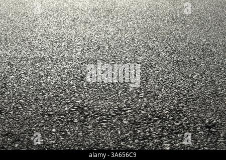 Asphalt und Asphaltierung der Straße. Nahaufnahme Stockfoto
