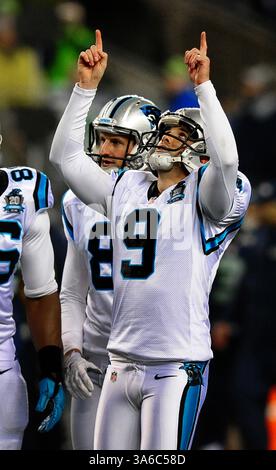 10. Januar 2015 - Seattle, WA, USA - der Carolina Panthers-Kicker Graham Gano (9) feiert sein 35-Yard-Field-Tor gegen die Seattle Seahawks während des zweiten Quartals in der NFC Division Playoff Action im CenturyLink Field in Seattle am Samstag, 10. Januar 2015. (Abbildung: © Jeff SINER/TNS/ZUMA Wire) Stockfoto