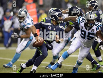 10. Januar 2015 - Seattle, WA, USA - Seattle Seahawks Quarterback Russell Wilson (3) spielt am Samstag, 10. Januar 2015, gegen die Carolina Panthers in der zweiten Halbzeit in der NFC Division Playoff Action im CenturyLink Field in Seattle. Die Seahaws gewannen mit 31:17. (Bild: © David T. Foster/TNS/ZUMA Wire) Stockfoto