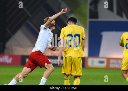 NIECIECZA, POLEN - 21. MÄRZ 2025: Freundschaftsspiel unter 20 Elite League Polen gegen Rumänien. Polnische Mannschaft feiert Szymon Karasiński Tor. Stockfoto