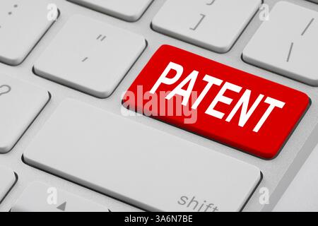 Lizenz. Computertastatur mit Wort Patent auf rotem Knopf, Nahaufnahme Stockfoto