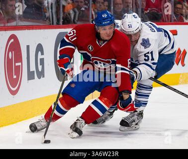 14. FEBRUAR 2015: Christian Thomas #60 des rechten Flügels Montreal Canadiens beschützt den Puck vor Jake Gardiner #51 der Toronto Maple Leafs während eines NHL-Spiels zwischen den Toronto Maple Leafs und den Montreal Canadiens im Bell Centre in Montreal, Quebec, Kanada. Philippe Bouchard/CSM(Bild: © Philippe Bouchard/Cal Sports Med/Cal Sport Media/ZUMAPRESS.com) Stockfoto