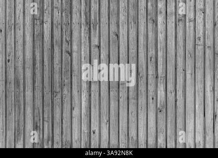 Raue nahtlose Holzwand Hintergrundstruktur, Nahaufnahme von grauen Dielen Stockfoto