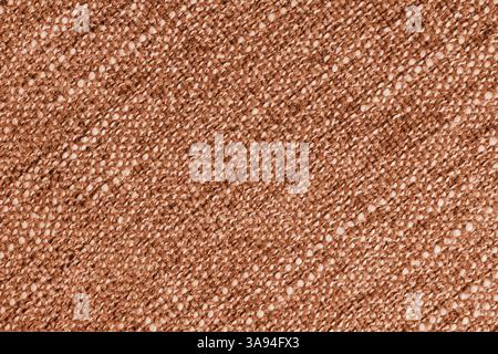 Orangefarbener Jacquard-Stoff mit großem, diagonal gewebtem Polsterstoff mit grober Webstruktur. Textilhintergrund, Möbel Textilmaterial, Wallpap Stockfoto