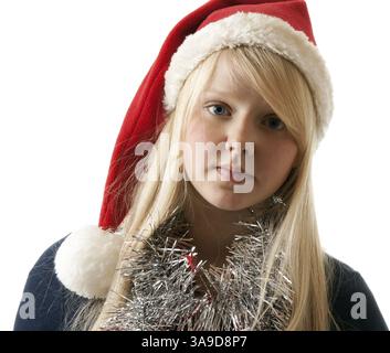 Eine schöne junge Blonde in eine Weihnachtsmütze auf weißem Hintergrund Stockfoto