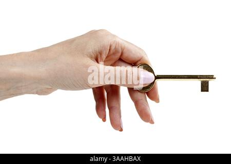 Frauenhand mit Schlüssel, isoliert auf weißem Hintergrund Stockfoto