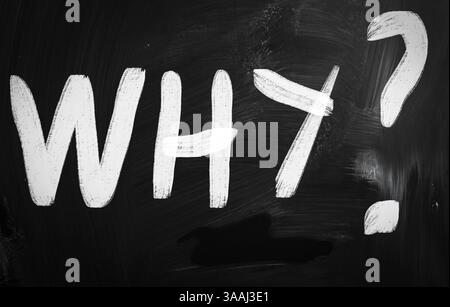 Warum mit weißer Kreide auf einer Tafel handschriftliche Stockfoto