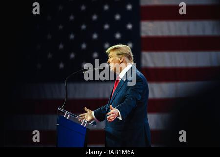NATIONAL HARBOR, MD, USA – 24. Februar 2024: Donald Trump spricht im CPAC über seinen Plan, den derzeitigen Präsidenten Joe Biden im November zu besiegen. Stockfoto