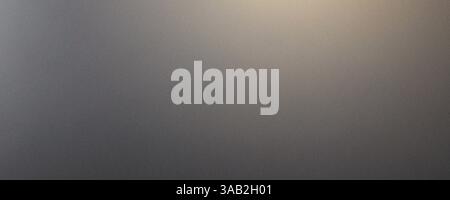 Ein ruhiges Bild mit einem subtilen Farbverlauf, der von Grau zu Hellbeige übergeht. Perfekter Hintergrund Stockfoto