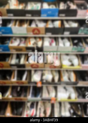 Verschwommener Hintergrund des Shoes Store in der Shopping Mall, abstrakter Hintergrund zur Präsentation Stockfoto