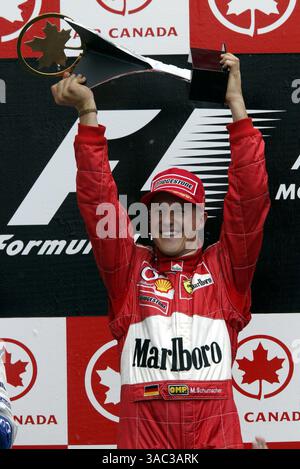 Michael Schumacher (GER) Ferrari feiert seinen Sieg auf dem Podium. Formel-1-Weltmeisterschaft, Rd8, Grand Prix von Kanada, Renntag, Montreal, Kanada, 15. Juni 2003..DIGITALES BILD (Credit Image: ©Sutton Motorsports/ZUMA Press) Stockfoto