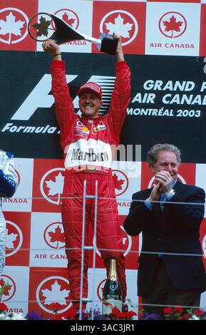 Rennsieger Michael Schumacher (GER) Ferrari feiert seinen Sieg auf dem Podium. . Grand Prix von Kanada, Rd 8, Montreal, 15. Juni 2003..Bestes BILD. (Kreditbild: ©Sutton Motorsports/ZUMA Press) Stockfoto