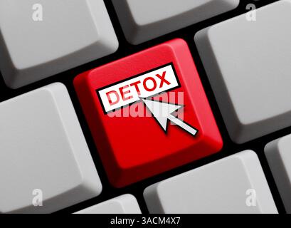 Farbige Taste auf einer Computertastatur mit Mauspfeil zeigt Detox Stockfoto