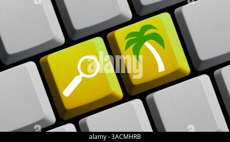 Urlaub suchen - Computertastatur mit Lupensymbol Stockfoto