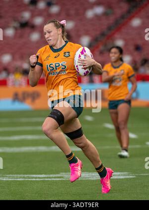 SINGAPUR, SINGAPUR. APRIL 2025 HSBC Singapur 7s Rugby Australien gegen Kanada Halbfinale für Frauen. Australisches Kraftwerk Maddison Levi in Aktion. Alamy Live Sport / Jayne Russell Stockfoto