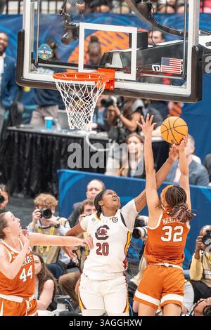 South Carolina Gamecocks Stürmer Sania Feagin (20) Blöcke Texas Longhorns Guard Ndjakalenga Mwenentanda (32) Schuss während der letzten vier Runde der W Stockfoto