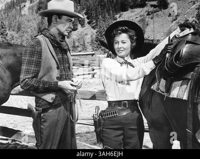 März 2006: Barry Sullivan, Barbara Stanwyck, am Set des Films „die Maverick-Königin“, 1956 (Foto: © Glasshouse/ZUMA Wire) Stockfoto