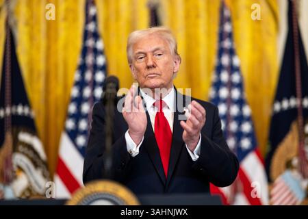 WASHINGTON DC, USA - 26. März 2025 - US-Präsident Donald Trump hält am Mittwoch, den 26. März, 20. März auf einer Veranstaltung anlässlich des Women’s History Month Stockfoto