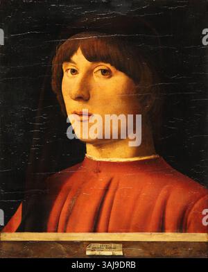 Porträt eines jungen Mannes von Antonello da Messina, gemalt 1474. Das vom Künstler signierte Ölgemälde wurde auf Pappeltafeln gefertigt. Sie ist in der Gemäldegalerie in Berlin untergebracht und zeigt den charakteristischen Realismus und das Porträtgeschick des Künstlers aus der italienischen Renaissance. Stockfoto