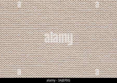 Neutrales Strickgewebe aus Baumwolle mit komplizierter Textur, ideal für Overlay-Designs. Stockfoto