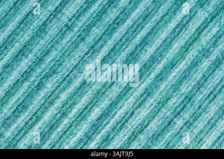 Ridge Makrotextur aus Velours Cordtuch Türkis. Großer gerippter, diagonaler grober Webstoff aus Samt, gestreifte Polsterung Textur Stoff Hintergrund, Stockfoto