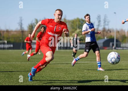 Almere, Niederlande. April 2025. ALMERE, 12.04.2025, Yanmar-Stadion, Saison 2024/2025, Dutch Betnation Tweede Divisie Football. Jong Almere City FC Spieler Guus Beaumont während des Spiels Jong Almere City FC - ADO20 Credit: Pro Shots/Alamy Live News Stockfoto