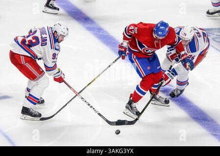 12. April 2017: Mika Zibanejad (93), Alexander Radulov (47) und Brady Skjei (76) der New York Rangers kämpfen um den Puck während des Playoffs der New York Rangers und Montreal Canadiens im Bell Centre in Montreal, QC. New York besiegte Montreal mit 2:0. John Crouch/CSM(Credit Image: &Copy; John Crouch/Cal Sport Media/CSM via ZUMA Wire) Stockfoto