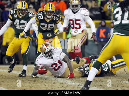 5. Januar 2014 - Green Bay, WI, USA - San Francisco 49ers Running Back Frank Gore (21) erzielt am Sonntag, den 5. Januar 2014, einen Touchdown im zweiten Quartal gegen die Green Bay Packers in ihrem NFC-Wildcard-Playoff-Spiel im Lambeau Field in Green Bay, Wiss. (Bild: © Mike de Sisti/MCT/ZUMAPRESS.com) Stockfoto