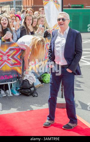 Louis Walsh kommt für XFactor 2014 bei Emirates Old Trafford Manchester, Großbritannien Stockfoto