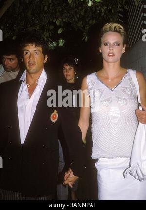APRIL 2011: SYLVESTER STALLONE UND BRIGITTE NIELSEN. BILL HOLZ/MICHELSON/ 1985(Bild: © Globe Photos/ZUMAPRESS.com) Stockfoto