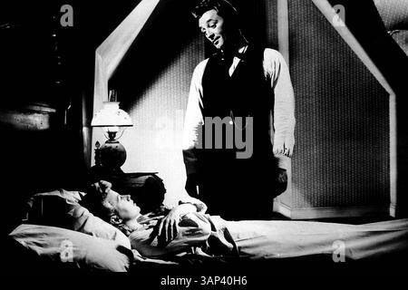 1. JANUAR 2011: ROBERT MITCHUM UND SHELLEY ÜBERWINTERN IN THE NIGHT OF THE HUNTER. TV/FILMAUFNAHME. BEREITGESTELLT VON:(Kreditbild: © Globe Photos/ZUMAPRESS.com) Stockfoto