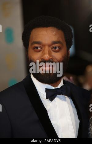 Schauspieler Chiwetel Ejiofor kommt am 16. Februar 2014 zu den 66. Jährlichen British Academy Film Awards, auch bekannt als EE British Academy Film Awards, auch bekannt als BAFTAs, im Royal Opera House in London Stockfoto