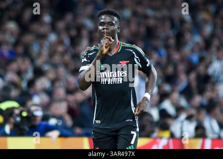 Madrid, Spanien. April 2025. Bukayo Saka aus Arsenal feiert sein Tor im zweiten Legspiel der UEFA Champions League zwischen Real Madrid und Arsenal am 16. April 2025 in Madrid. Gustavo Valiente/Xinhua/Alamy Live News Stockfoto