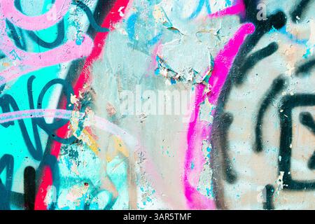 Lebendige Graffiti-Textur mit Neon- und Pastelltönen für die Ästhetik der 90er Jahre Stockfoto
