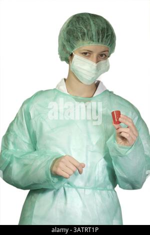 Junge Ärztin in Uniform Junge Ärztin in Uniform Stockfoto