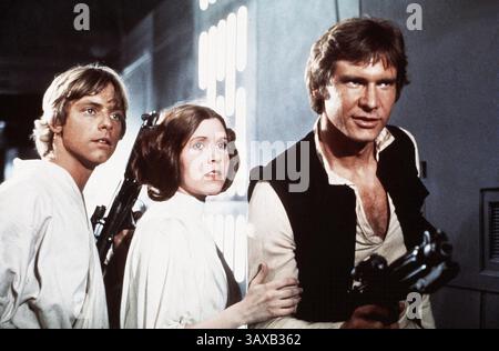 CARRIE FRANCES FISHER (21. Oktober 1956 â€“ 27. Dezember 2016) die Schauspielerin Leia Organa, die als Star Wars' Prinzessin bekannt ist, starb nach einem Herzinfarkt. Sie war 60. IM BILD: Star Wars: Episode VI – Ein Film der Neuen Hoffnung. ERSCHEINUNGSDATUM: 25. Mai 1977: MARK HAMILL als Luke Skywalker, CARRIE FISHER als Prinzessin Leia Organa und HARRISON FORD als Han Solo. (Kreditbild: © Lucas Films/Entertainment Pictures/ZUMAPRESS.com) Stockfoto