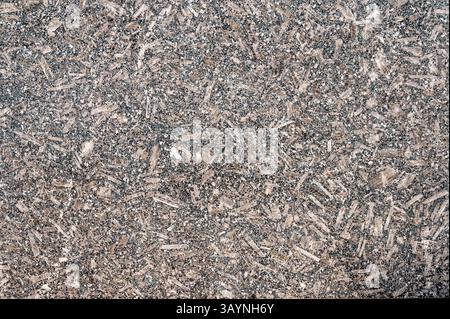 Verfügt über eine raue Textur und ein einzigartiges Gesteinsmuster, ideal als hochauflösende Textur für Baumaterialien, Innenarchitektur, Hintergründe, Tapeten, Stockfoto
